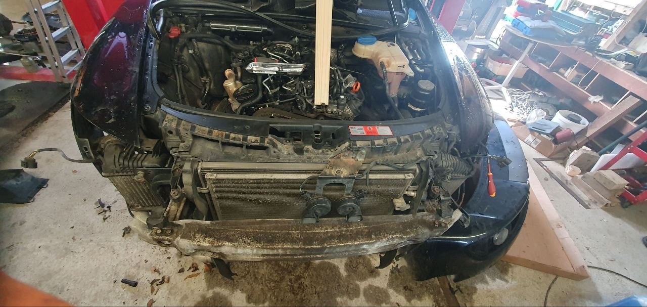 Kinnegad MOTORS workshop — car on the ramp